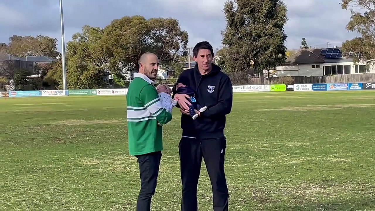 Travis Matheson and Tyrone Downie with their new daughters.