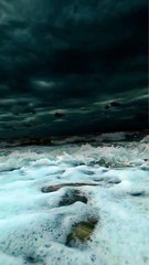 "Lost in the rhythm of the sea, where every wave is a soft lullaby."