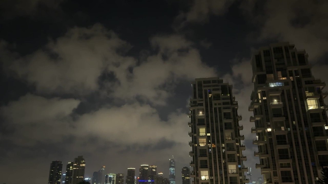 Missiles from Iran streaking night skies of Israel, West Bank as air attacks continue