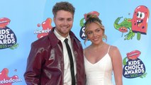 Alex Warren and Kouvr Annon 2025 Kids' Choice Awards Orange Carpet