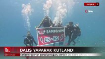 Eskişehirspor’un şampiyonluğunu denizin 26 metre altında kutladılar