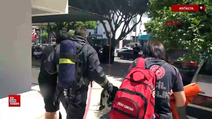 Antalya'da yangında mahsur kaldığı evde kedisini bir an bile bırakmadı