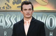 Rupert Friend missed the birth of his daughter as he was filming Jurassic World Rebirth