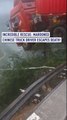 Incredible rescue: Marooned Chinese truck driver escapes death!