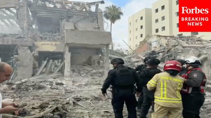 Residents Of Haifa, Israel, Survey Damage As Iranian Airstrikes Continue