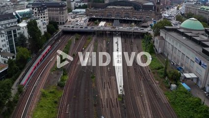 Forwards fly above railway tracks