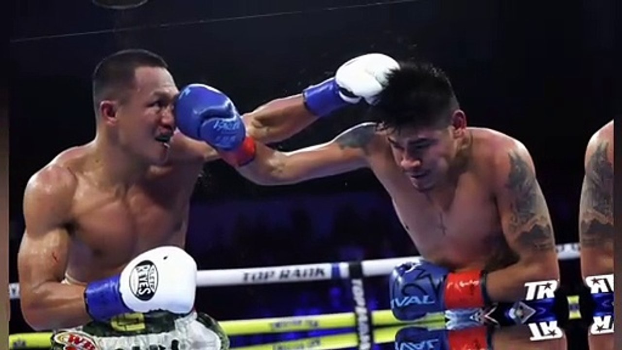 Emanuel Navarrete vence a Charly Suarez por decision tecnica en sangrienta defensa titular