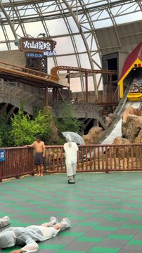 Water Ride Sends Huge Splash—Umbrella Shield Fails Hard!