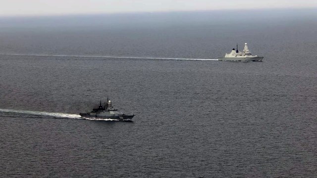 Royal Navy warships including HMS Duncan shadows Russian ships