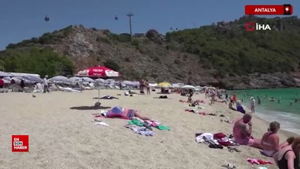 Alanya'da aşırı sıcaklar sahilleri doldurdu