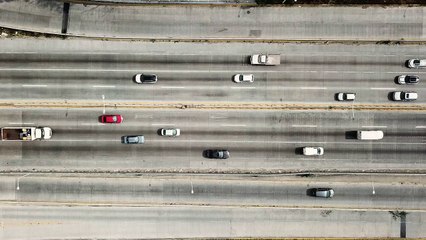 mixkit-highway-traffic-seen-through-drone-611-hd-ready