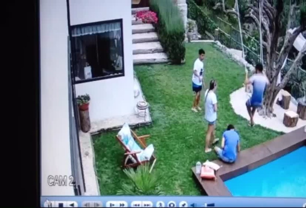 Boy on Swing Knocks Friend into Pool