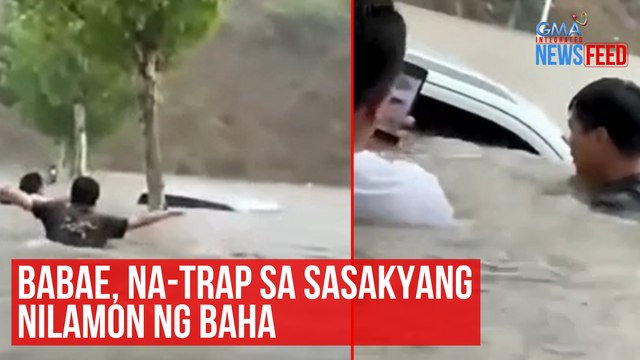 Babae, na-trap sa sasakyang nilamon ng baha | GMA Integrated Newsfeed