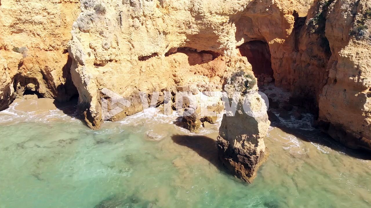 Cliffs and caves of pristine Atlantic Ocean coast, Lagos, Algarve, Portugal