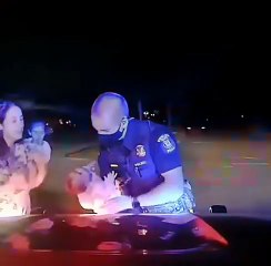 A Michigan cop pulled over a reckless driver and ended up saving a choking baby