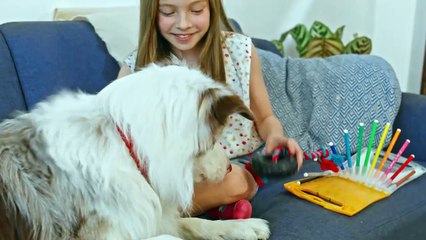 Woman playing with her dog
