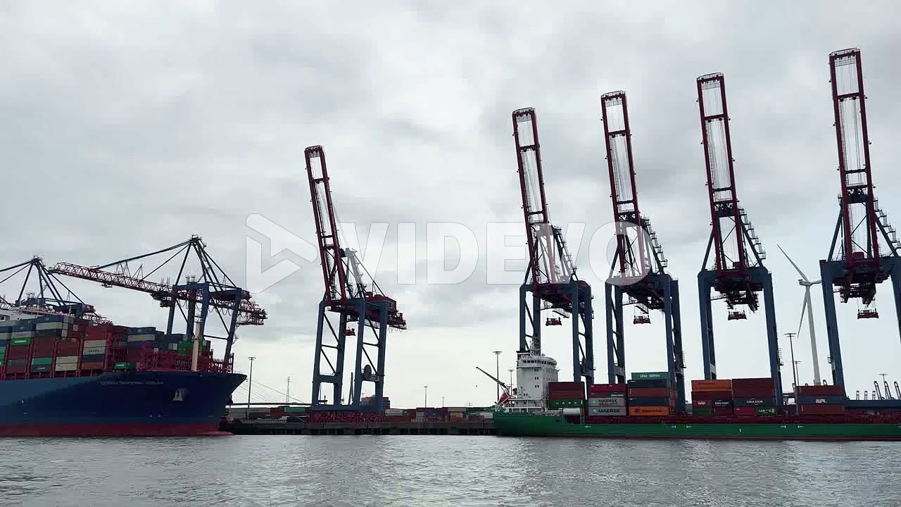 Cranes and cargo ship in the port of Hamburg