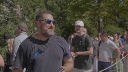 Man sleeps overnight on a dog bed in queue for Wimbledon tickets