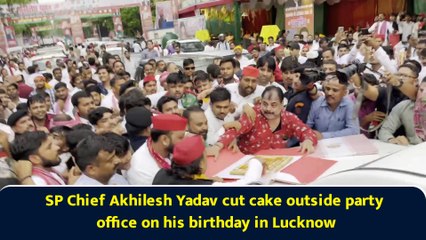 SP Chief Akhilesh Yadav cut cake outside party office on his birthday in Lucknow
