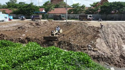 amazing Nice process landfill clear lake by bulldozer pushing with truck Spreading