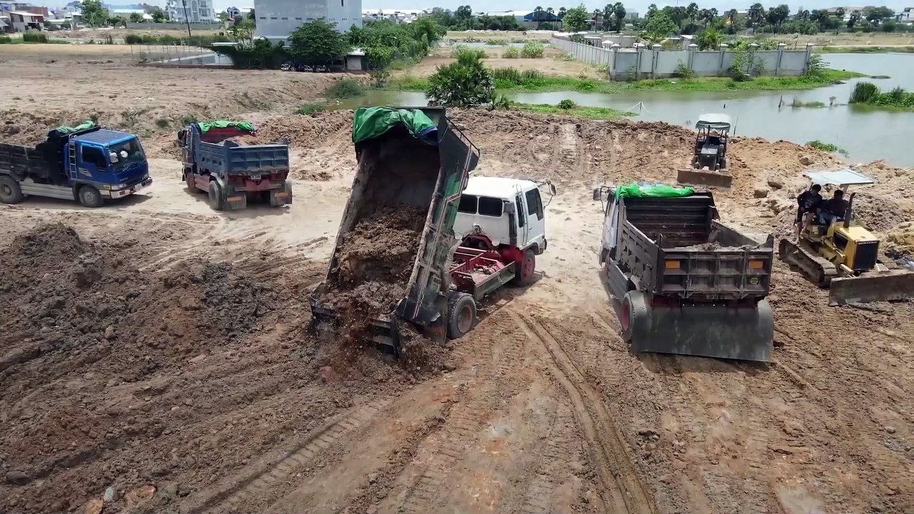 Amazing-Episode-Powerful-Bulldozer-KOMATSU-D31P-and-D21P-Showing-Skill-Pushing-Soil-Refill-Lake