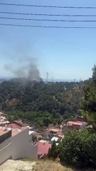Unos vecinos graban el incendio de un camión de la basura en Torre Baró