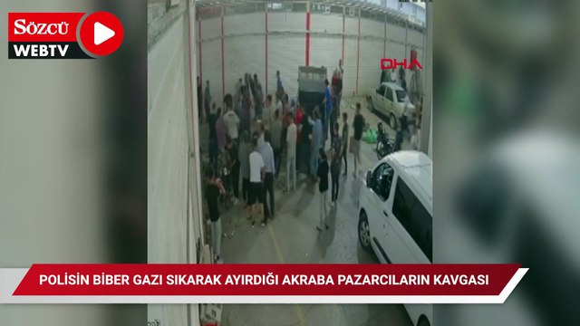 Polisin biber gazı sıkarak ayırdığı akraba pazarcıların kavgası kamerada