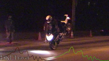 Bikers Doing Wheelies in Traffic Until Police Break Up the Fun