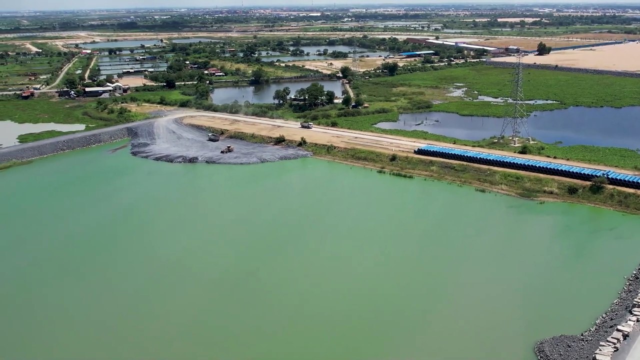 Wheels Loader SDLG Pushing Rock and Heavy Loading Dump Trucks working In construction projects