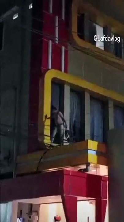 Public freaks out at Indian man trying to flee hotel room after getting caught.