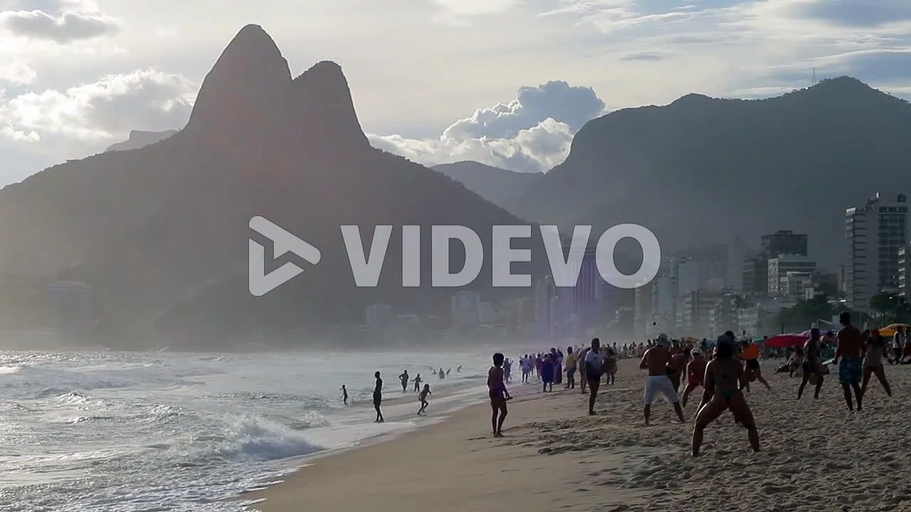Copacabana Beach with Rio de Janeiro city skyline and the famous mountains in the background