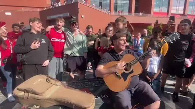Liverpool fans sing Diogo Jota's name outside Anfield