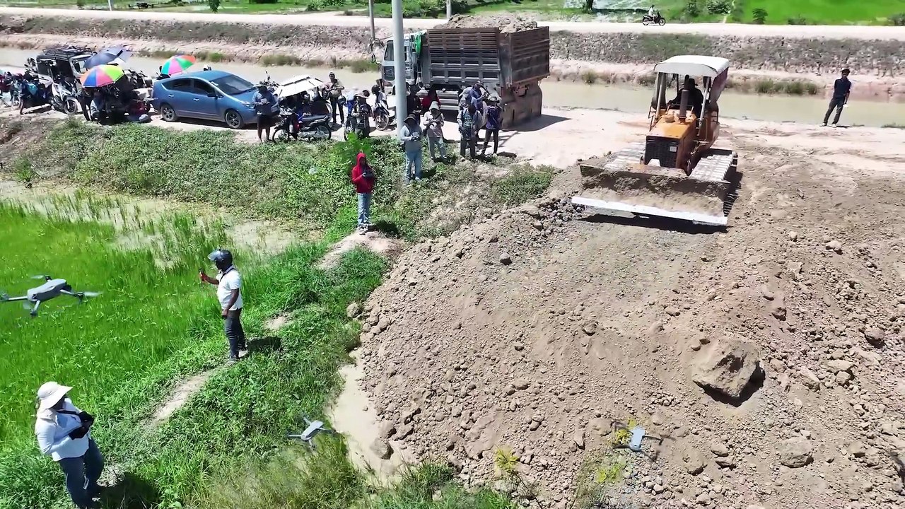 Great new project by Dozer D31P. Filling the ditch.To build a road to the front yard.