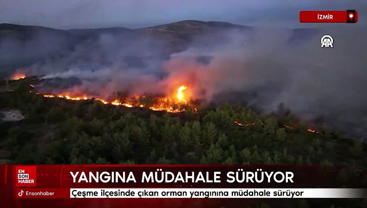 İzmir'in Çeşme ilçesinde çıkan orman yangınına müdahale sürüyor