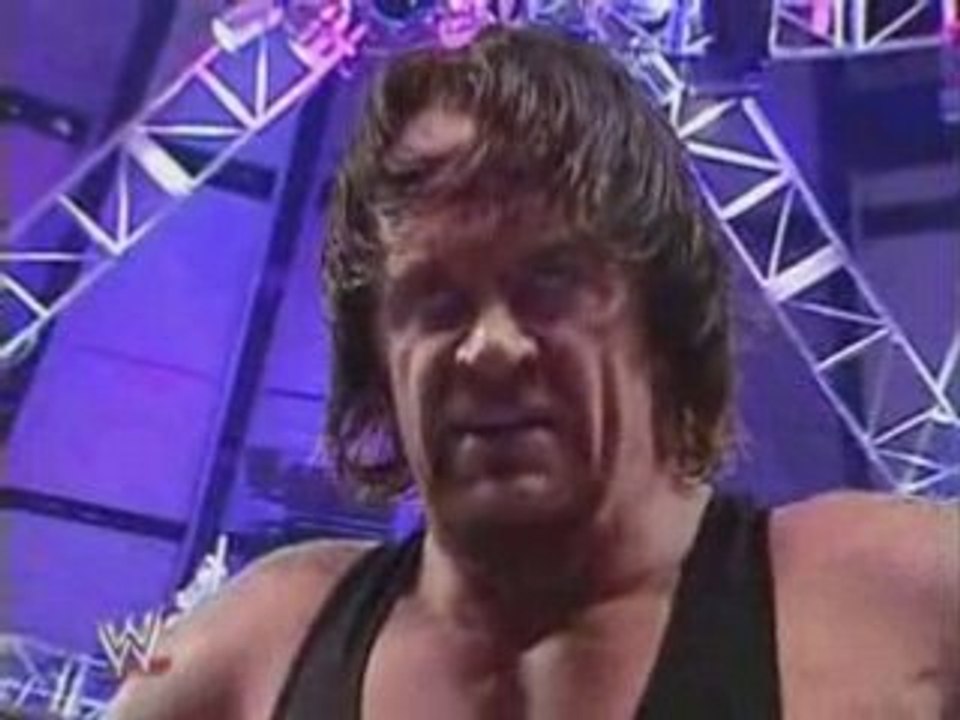 Undertaker tombstones and defeats Kane at Wrestlemania XX