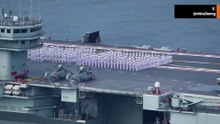 Video: Shandong, het eerste in China gebouwde vliegdekschip, arriveert in Hongkong voor bezoek