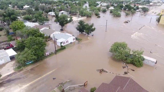 Texas city submerged as flash floods leave 24 dead & dozens missing