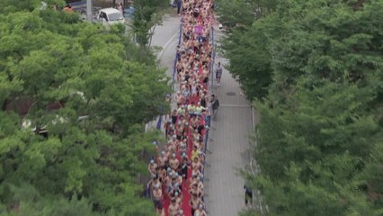 무더위 속 석촌호수...수영 경기·산책 인파 '활기' / YTN