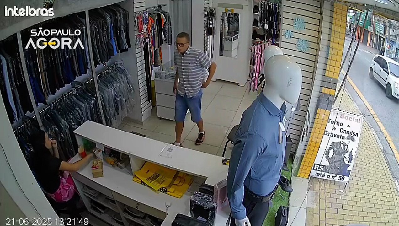 Thief robbing a store in Brazil