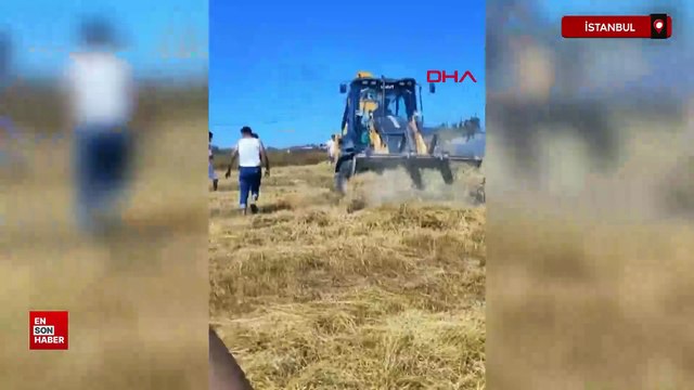 İstanbul'da bir tarlada çıkan yangına, vatandaşlar hortumla müdahale etti