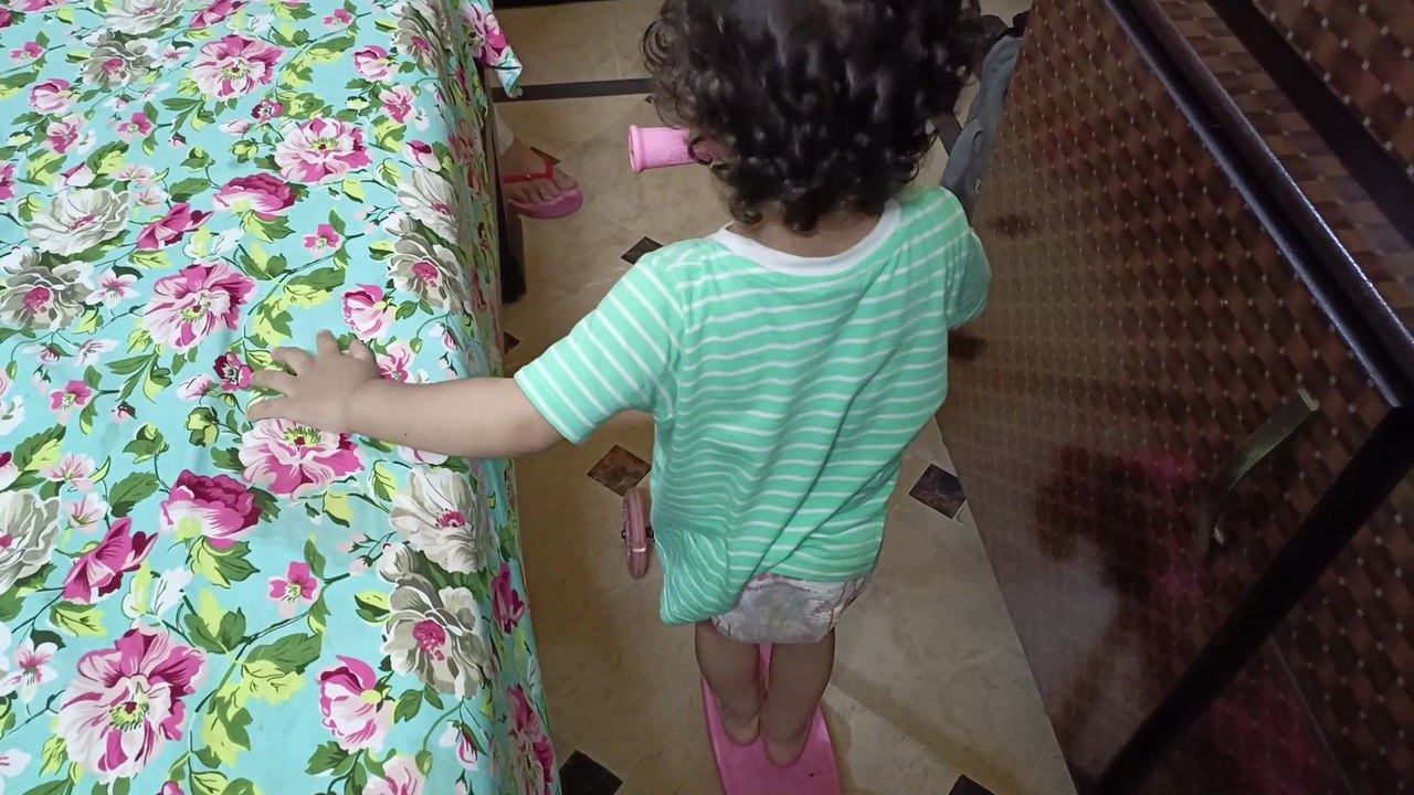 baby's  diaper smells😃,while fearless baby is riding a scooter 😍