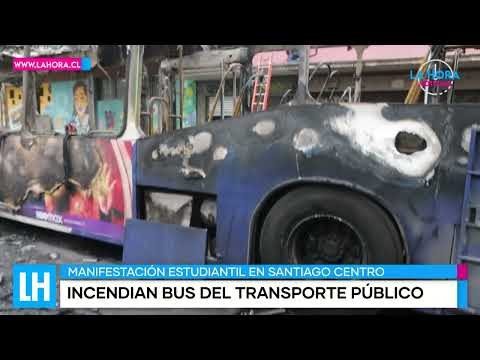 LH Noticias: Encapuchados incendian micro del transporte publico en frontis del liceo Barros Borgoño