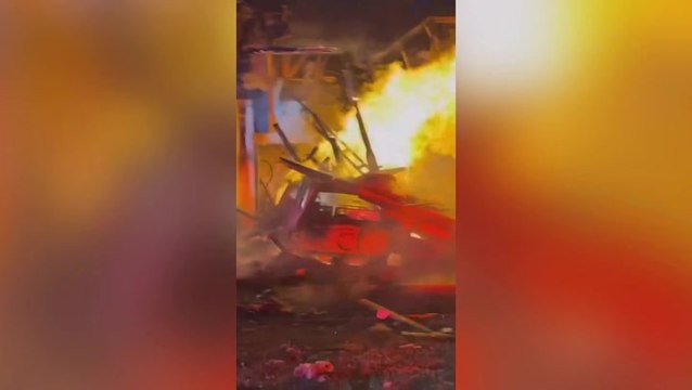 Explosion tears roof off Domino’s Pizza after car crashes into restaurant