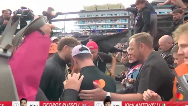 Lando Norris left with bloody nose after man falls off pit wall and lands on McLaren driver at British Grand Prix