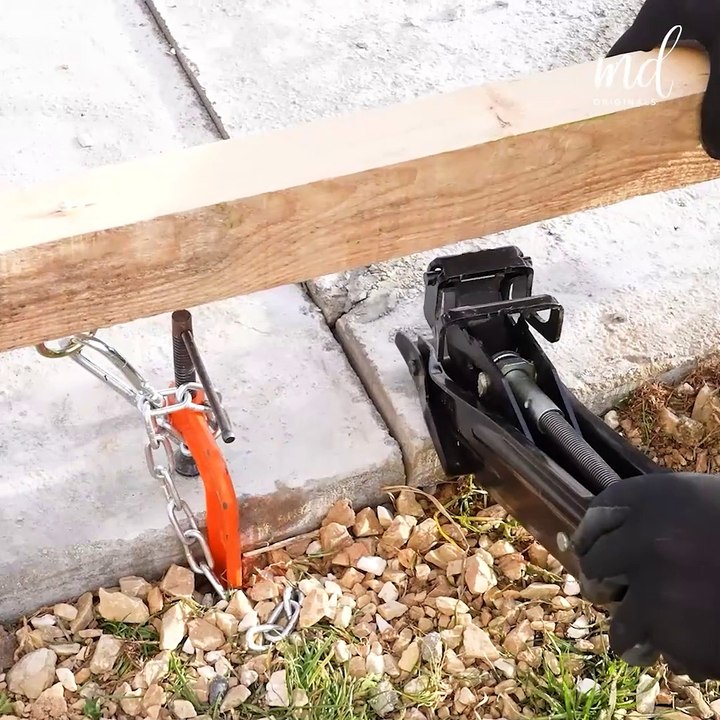 Repairing a sunken concrete pathway