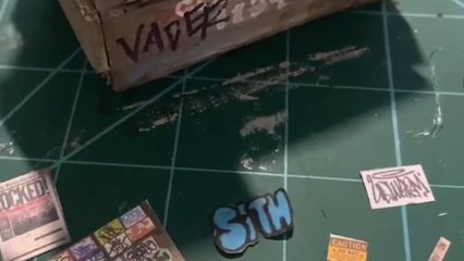 Artist shows how to make a miniature dumpster using craft materials