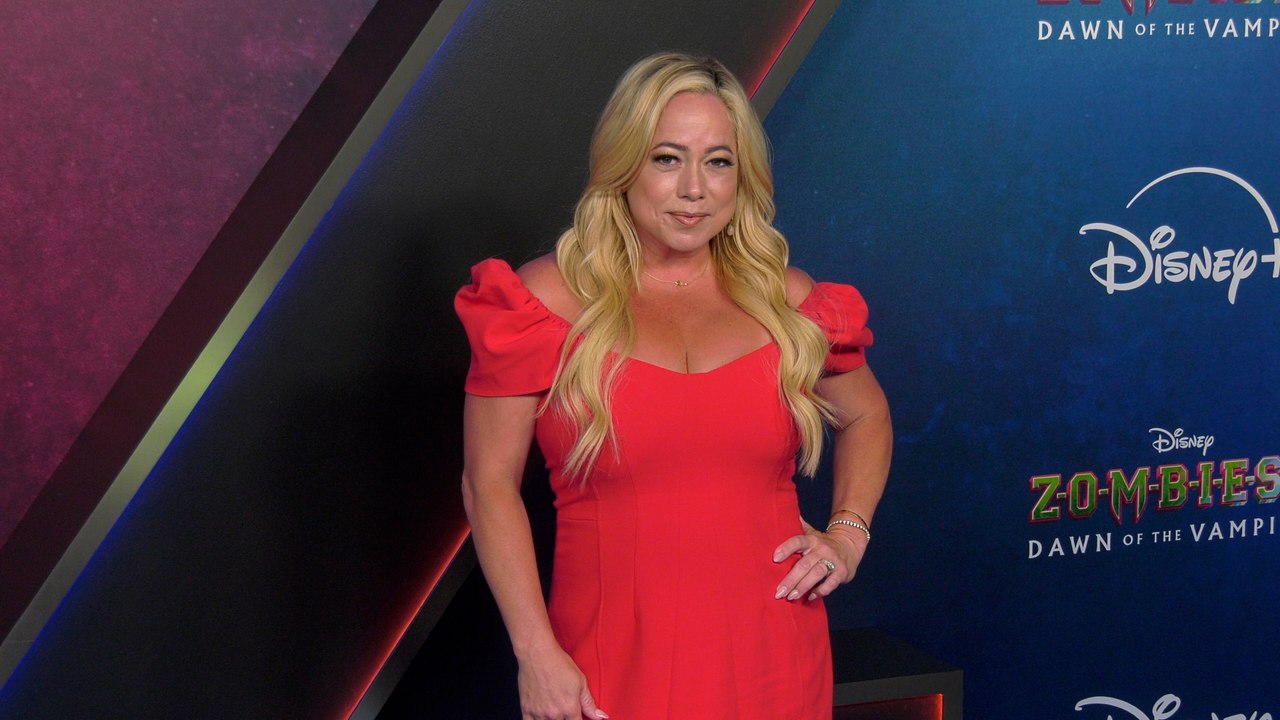 Sabrina Bryan "Zombies 4: Dawn of the Vampires" Premiere Blue Carpet