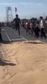 Player Back Flips in Long Jump