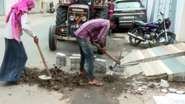 RAJKOT JUBILEE CHOWK REPAIRING ON DAMAGED ROAD DUE TO RAIN