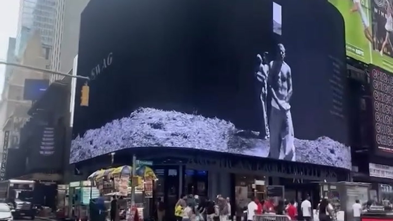 Justin Bieber teases surprise album with huge billboard in Times Square